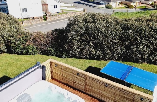 Trearddur Bay House | Trearddur Bay Home with a View, Beach & Snowdon Mountain Range and Hot Tub