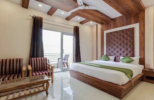 Dehradun Hotel | Treebo G K Residency Near Dehradun Railway Station