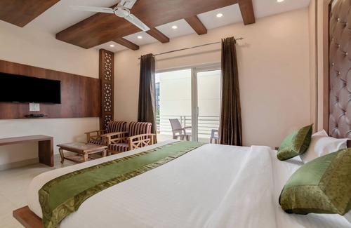 Dehradun Hotel | Treebo G K Residency Near Dehradun Railway Station