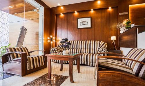 Dehradun Hotel | Treebo Grand Legacy Elite With Roof Top Cafe