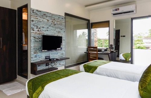 Nigdi Hotel | Treebo Malhaar Regency