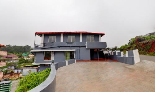 Stuart Hill Hotel | Treebo New Redfern, Madikeri