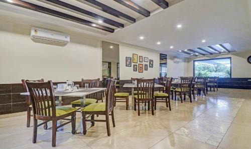 Bengaluru Hotel | Treebo Premium Raj Vista Global Village