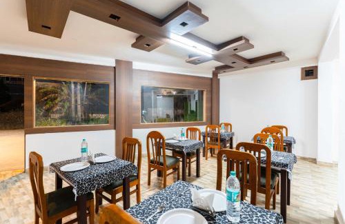 Mahadevpet Hotel | Treebo Regalia Comforts, 15 Mins From Abbey Waterfall