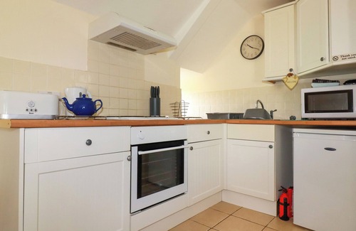 Newquay Cottage | TREVARTHIAN FARM (ANNEX), pet friendly, with a garden in