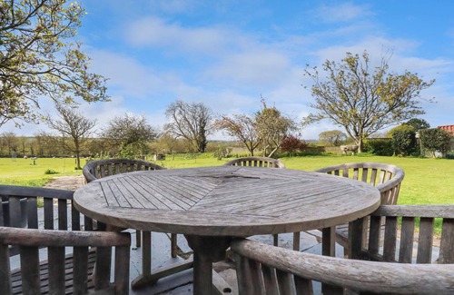 Newquay Cottage | TREVARTHIAN FARM (ANNEX), pet friendly, with a garden in