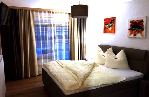 Unterburg am Klopeiner See House | Triple room - Lindenhof - Restaurant & Pension