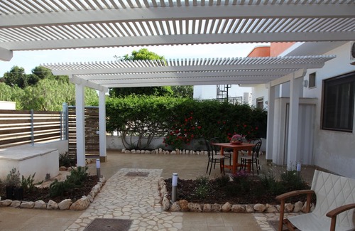 Torre Lapillo House | Triple Room in Punta Prosciutto Bed near the sea