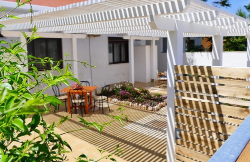 Torre Lapillo House | Triple Room in Punta Prosciutto Bed near the sea