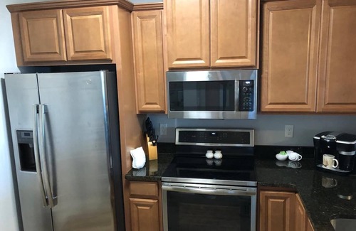 Bouchelles Island Condo | Tropical Breeze Getaway! Watch the Shuttles from the Balcony! New Smyrna Beach!
