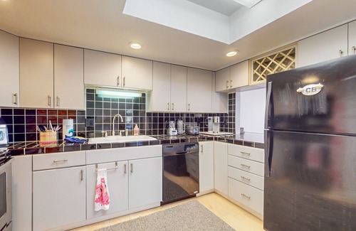 Cocoa Beach Condo | Tropical condo with pool, central AC and private beach access