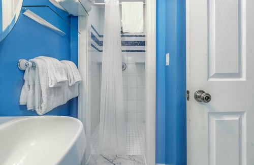 The Meadows Condo | Tropical Escape with Central Locale, Private Hot Tub, WiFi, and Shared Pool
