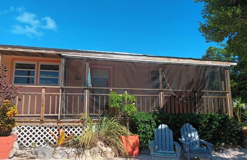 Morris Settlement Cottage | Tropical Hideaway - walk to the beach! FALL SPECIAL!