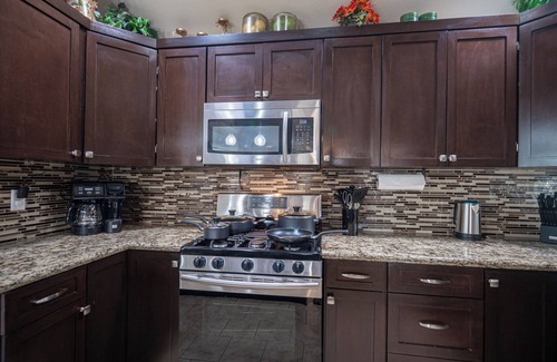 Sunrise Manor House | Tuscan Oasis: Elegance with Comfort. King bed.