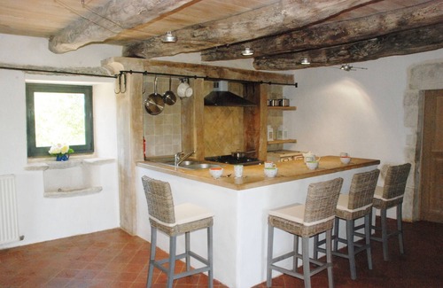 Ginals House | Two houses with a large swimming pool next to the ruins of a medieval castle