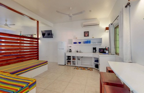 Caye Caulker House | Two open, tropical studios w/WiFi, partial AC & great location near the beach