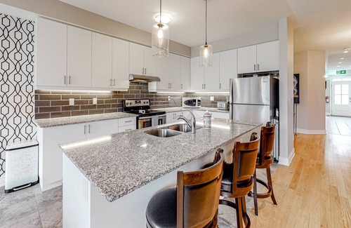 The Blue Mountains Condo | Two-story condo with patio, fireplace, grill, & heated pool - dog-friendly