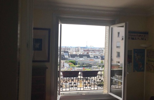 11th Arrondissement Apartment | Typical Parisian apartment 56 m2 at Père Lachaise - balcony view of all of Paris