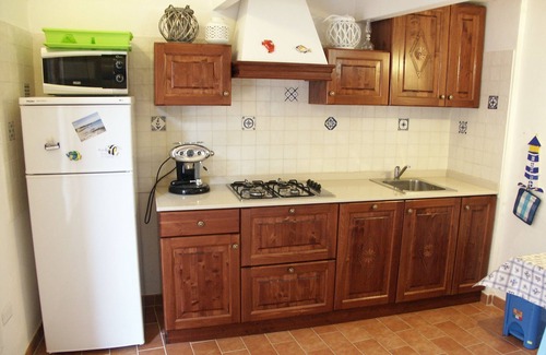Carloforte House | Typical small house of San Pietro with a view of the countryside and the sea, a Moorish guard resort