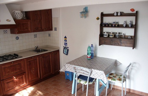Carloforte House | Typical small house of San Pietro with a view of the countryside and the sea, a Moorish guard resort