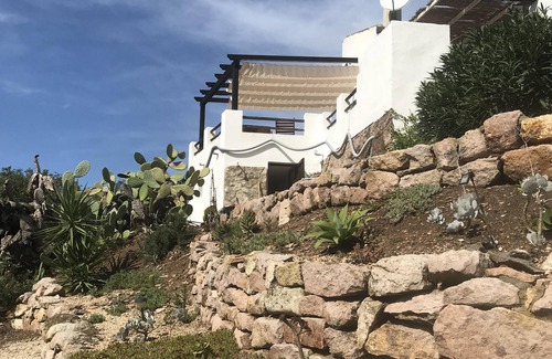 Carloforte House | Typical small house of San Pietro with a view of the countryside and the sea, a Moorish guard resort