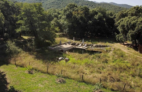 Petreto-Bicchisano House | U Pratu, bungalows surrounded by nature, natural pool and organic garden