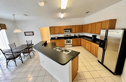 Legacy Park House | Ultra modern, two-story Legacy Park 4/3 Pool Home with formal dining. Pet Friendly!