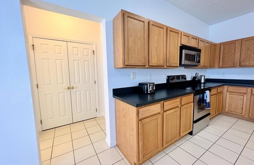 Legacy Park House | Ultra modern, two-story Legacy Park 4/3 Pool Home with formal dining. Pet Friendly!