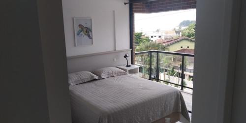 Guaratuba Apartment | Uma quadra da praia - Vista para o Mar - Guaratuba - AC e Wi-Fi