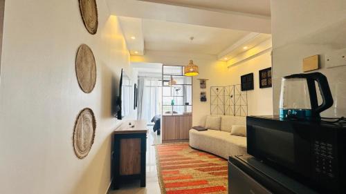 Central Province Apartment | UN approved snug studio with gym
