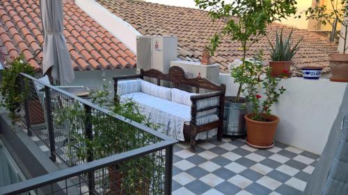 Plaka Apartment | Under the Acropolis, tiny room, big terrace