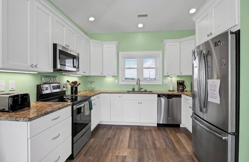 Village of Stump Sound House | Unforgettable vacation offering 20% discount. Beach, Elevator, Pool, Pet friendly