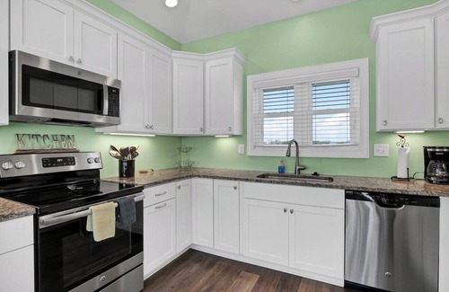 Village of Stump Sound House | Unforgettable vacation offering 20% discount. Beach, Elevator, Pool, Pet friendly