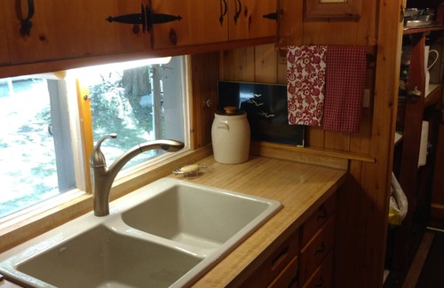 Charlevoix Cottage | Unique log cottage with view of Lake Michigan-pet friendly!