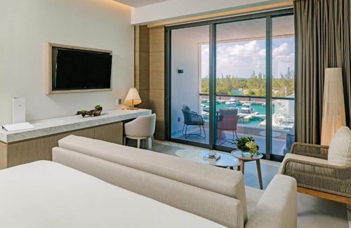 Punta Sam Hotel | Unwind in Style: Beachfront Resort w/Tranquil Pools, Spa & Delicious Cuisine