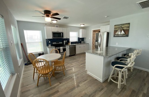 Galveston House | Updated 2 bedroom steps from the bay and the ocean!