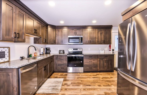 Manitowish Waters Cabin | Updated, tree-lined home on the snowmobile trail with gas fireplace & firepit