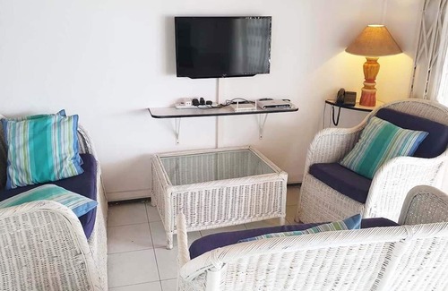 Pointe aux Canonniers Apartment | Upstairs apartment facing the sea and the beach