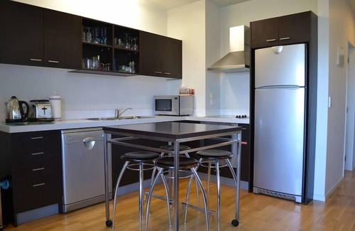 Whitianga Apartment | Upstairs fully self contained apartment with a queen bedroom.