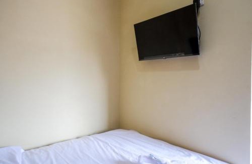 Pogung Lor Hotel | Urbanview Hotel Telu Wolu Monjali by RedDoorz