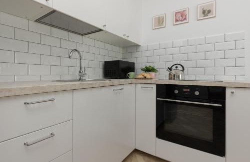 Ursus Apartment | Ursus Sunny Studio for 4 Guests with Parking & Balcony by Noclegi Renters