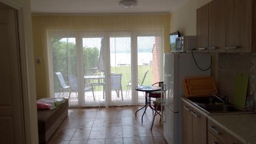 Szantod Apartment | Vízparti apartmanok