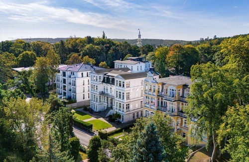 Seebad Heringsdorf Apartment | Vacation apartment on the Baltic Sea with conservatory - use of sauna in the house included!