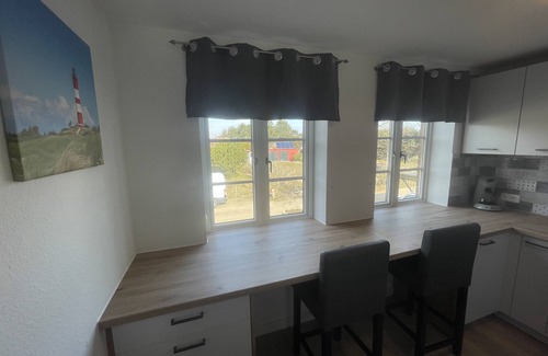 Suddorf Apartment | Vacation apartment "Haus Tarje" Your family vacation in the heart of the island of Amrum
