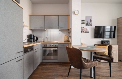 Muritz Apartment | Vacation apartment Müritzloge - with a view over the Waren harbor