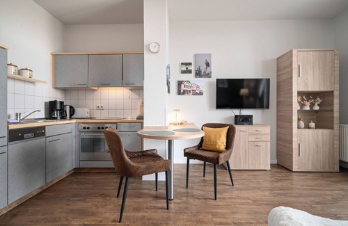 Muritz Apartment | Vacation apartment Müritzloge - with a view over the Waren harbor