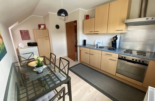 Niedermennig/Obermennig/Krettnach Apartment | Vacation apartment Im Hanfgarten - Apartment with south-facing balcony
