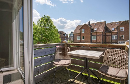 Ostersiel Apartment | Vacation apartment 'Kegelrobbe' with balcony for a relaxing break