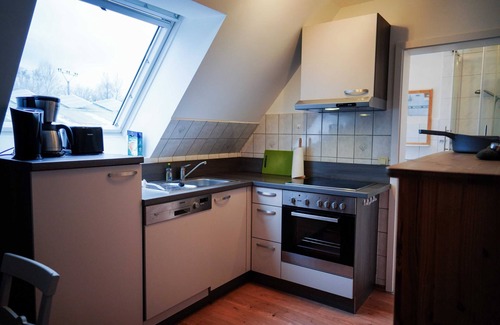 Steinberg Apartment | Vacation apartment Kutscherstube - Lindenhof