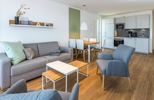 Bensersiel Apartment | Vacation apartment near the North Sea with balcony, parking, use of swimming pool & sauna -